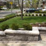 Chaplin Estates Project - Photo 3
After
Natural stone walls and flagstone walkway created in the front yard.